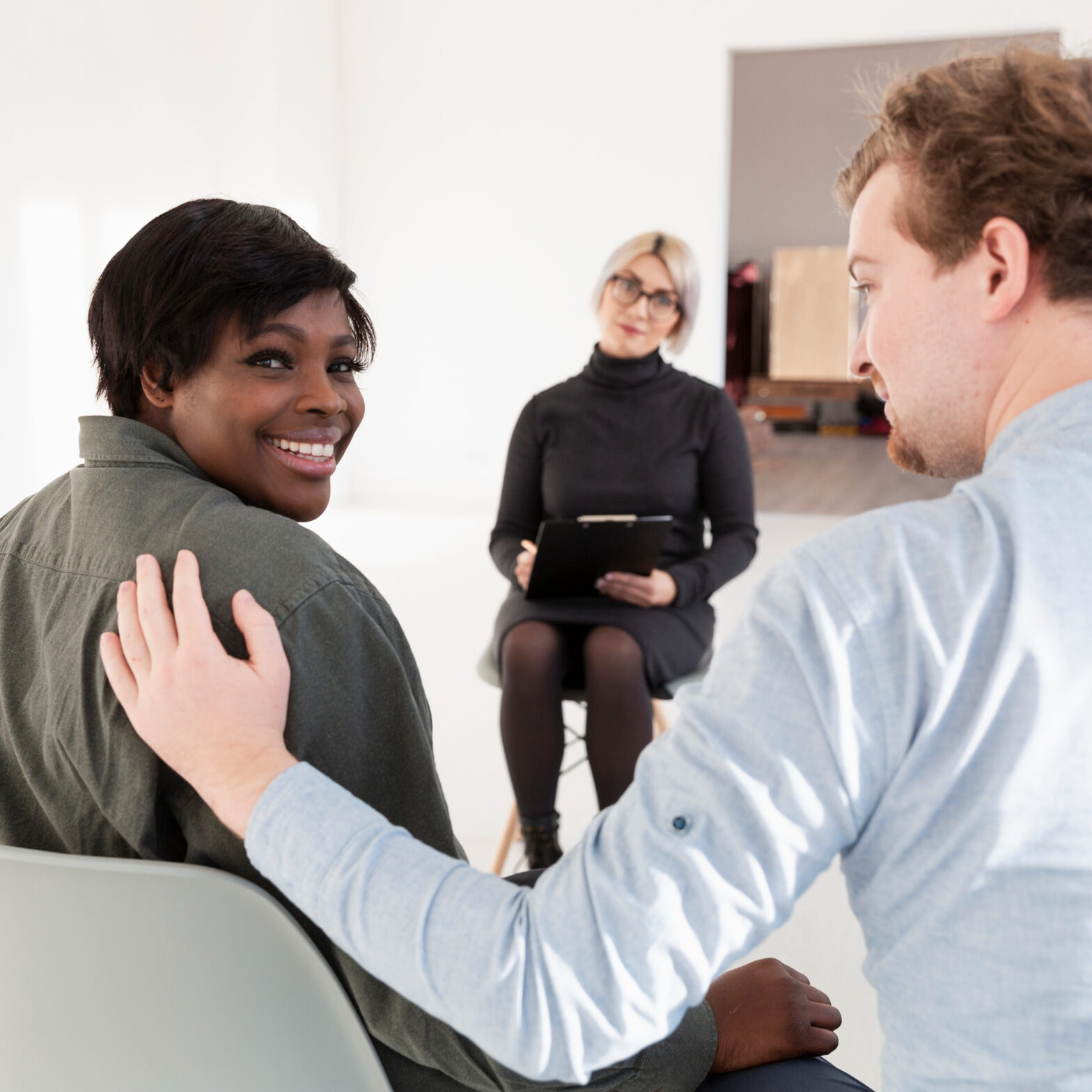 Business professional discussing mentoring strategies in a modern office setting