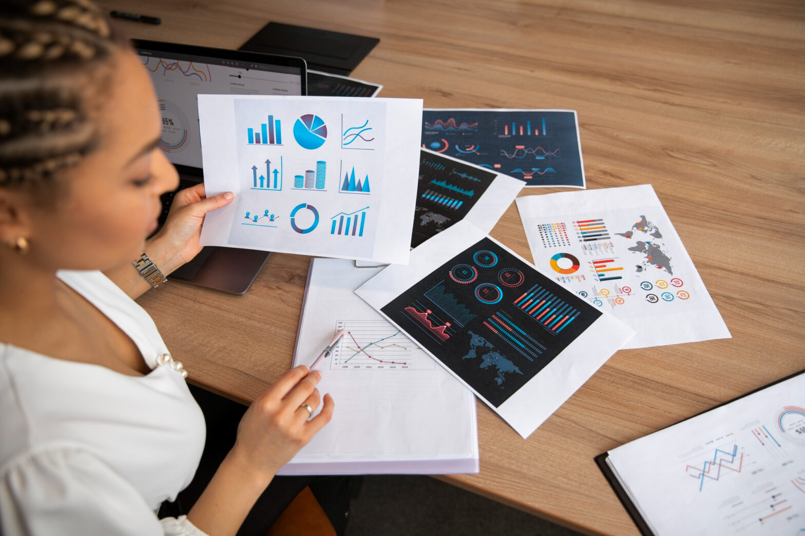 An illustrated infographic showing business professionals analyzing charts and data for market research strategies.